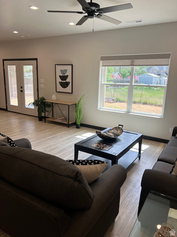 160 200 West Henefer, UT 84033 - Photo 11 of 25 Open concept living space featuring wood-finish flooring, recessed lighting, and a ceiling fan
