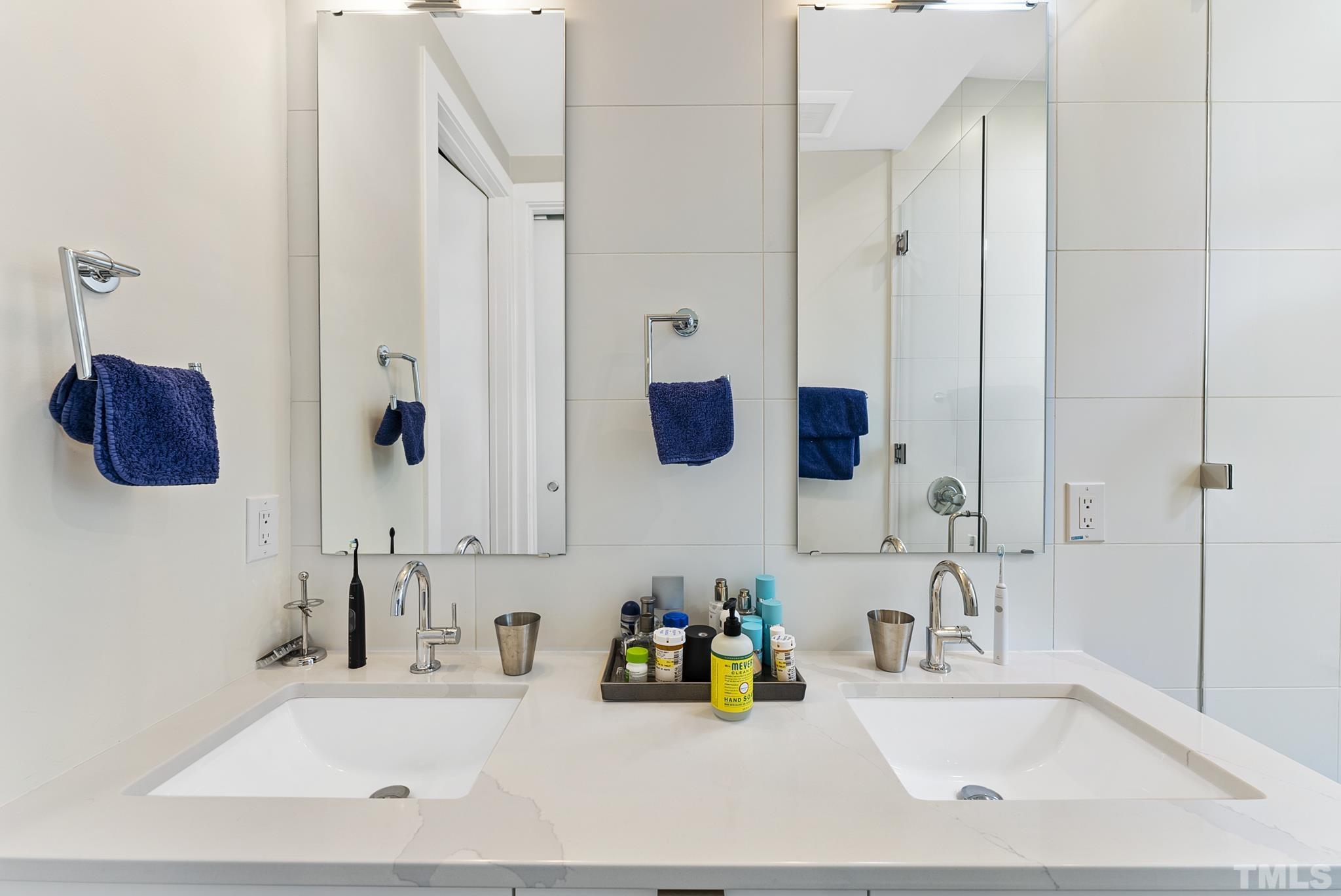 2323 Clark Avenue Raleigh, NC 27607 - Photo 15 of 33 a bathroom with a tub sink and mirror