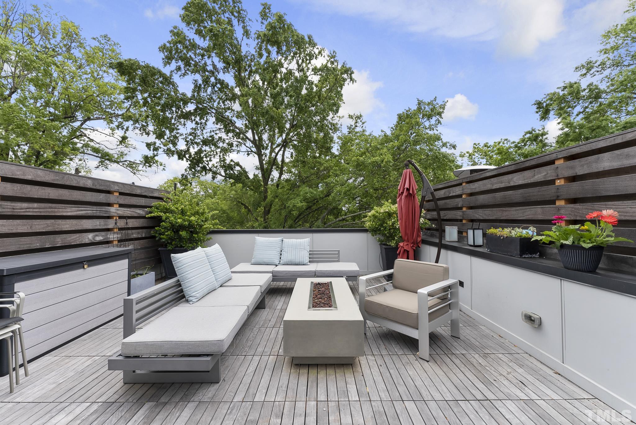 2323 Clark Avenue Raleigh, NC 27607 - Photo 20 of 33 a terrace of a house with outdoor seating