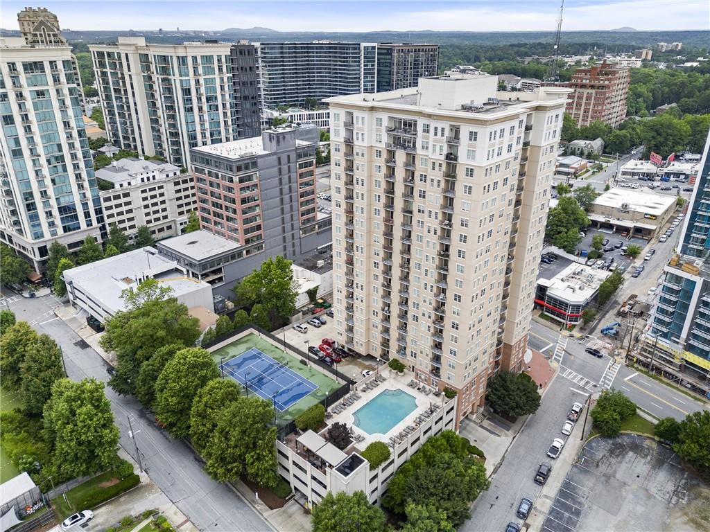an aerial view of city with balcony