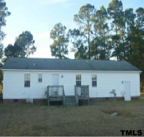 1199 Emmaus Church Road Dudley, NC 28333 - Photo 2 of 8 a view of a backyard