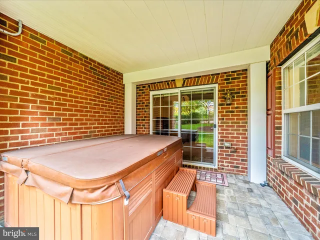 a front view of a residential apartment building with a yard