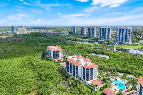 a view of a city with tall buildings