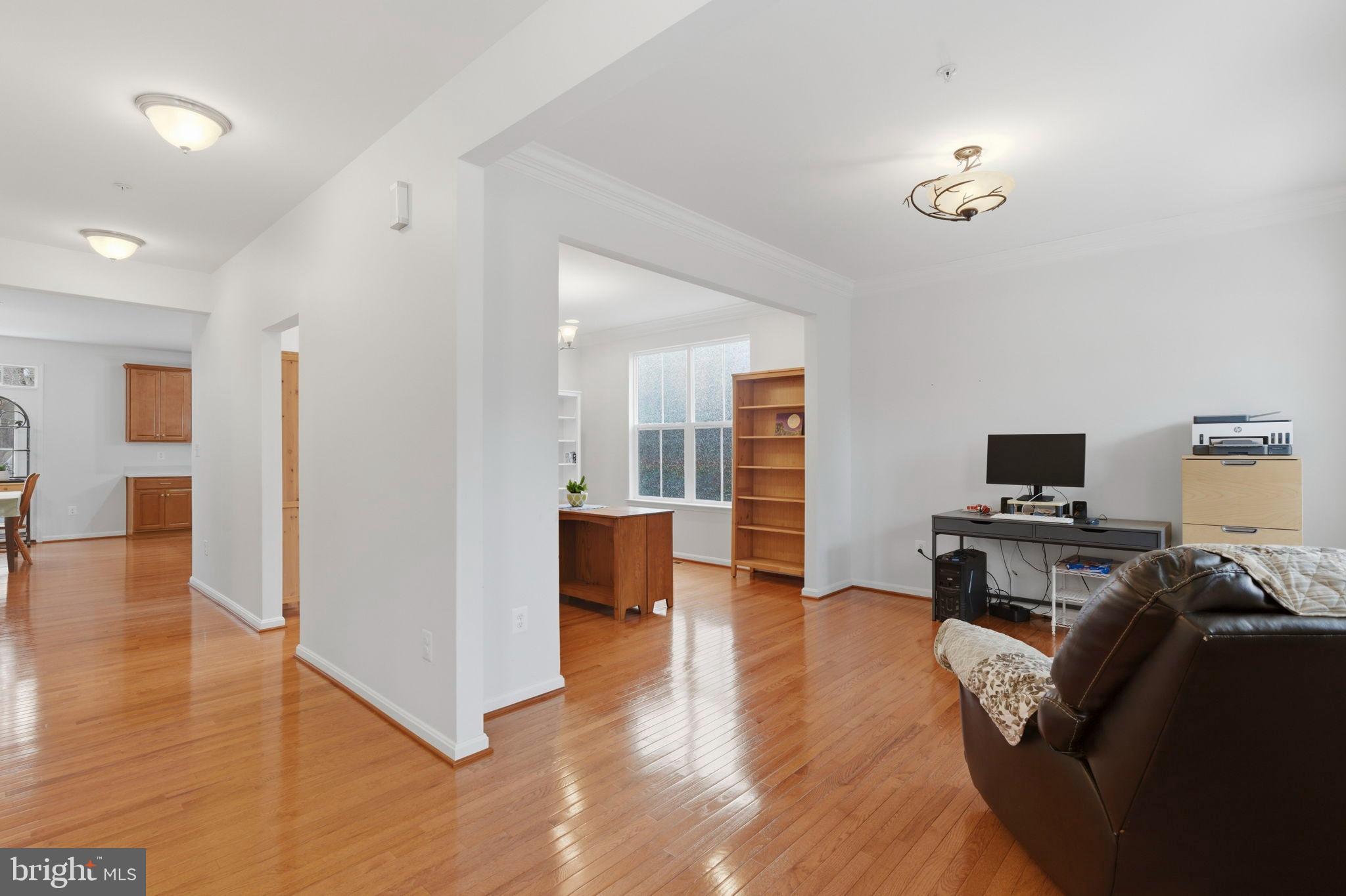 900 East Wheel Road Bel Air, MD 21015 - Photo 20 of 54 Spacious, sunlit open-concept living area.