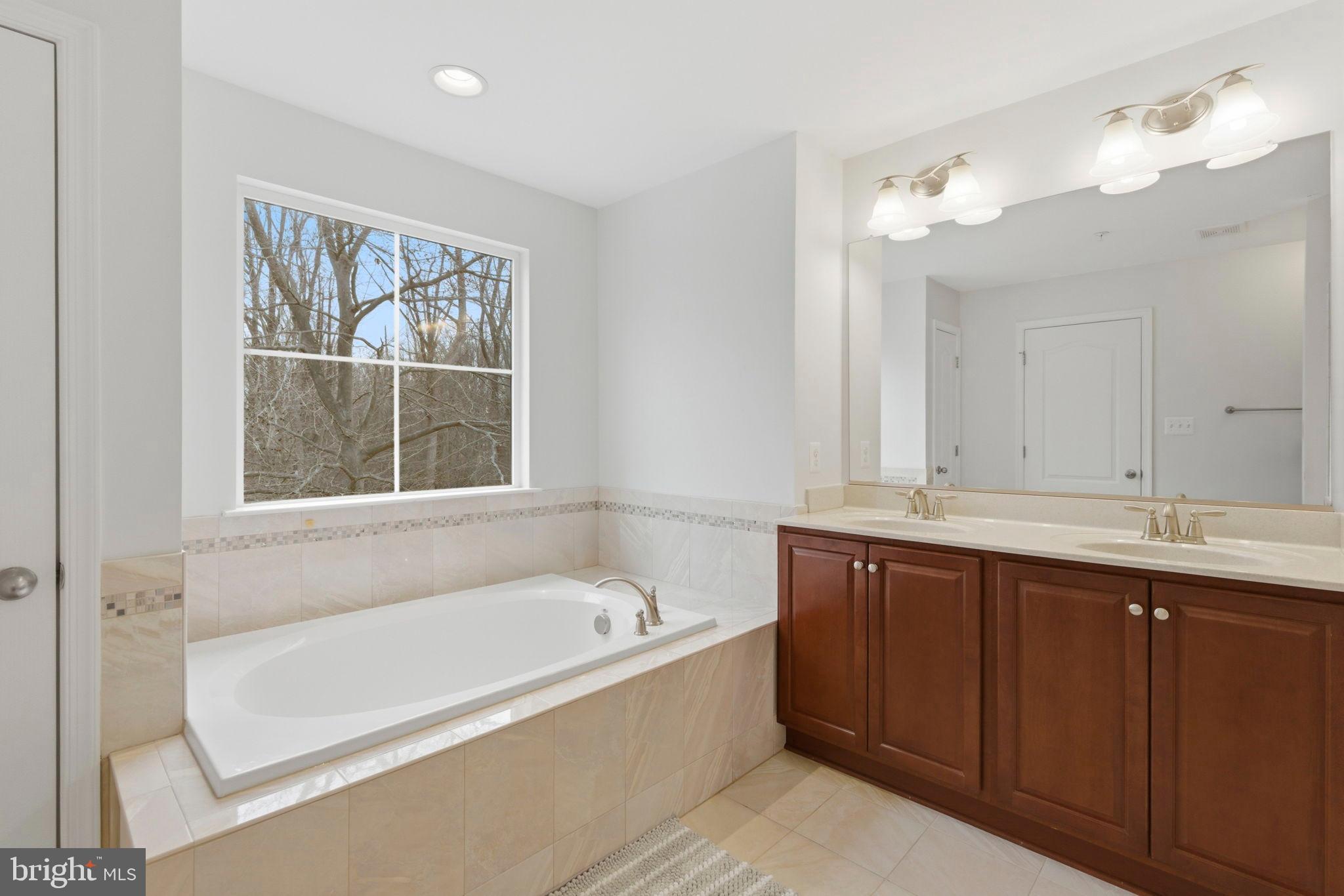 900 East Wheel Road Bel Air, MD 21015 - Photo 23 of 54 Serene bathroom with natural light and elegance.