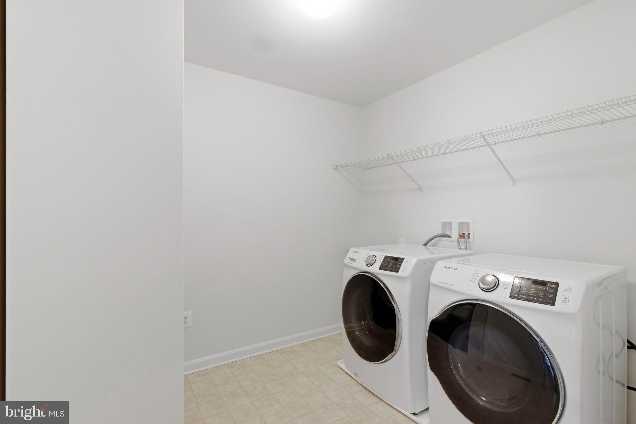 900 East Wheel Road Bel Air, MD 21015 - Photo 26 of 54 Modern laundry space with sleek appliances.