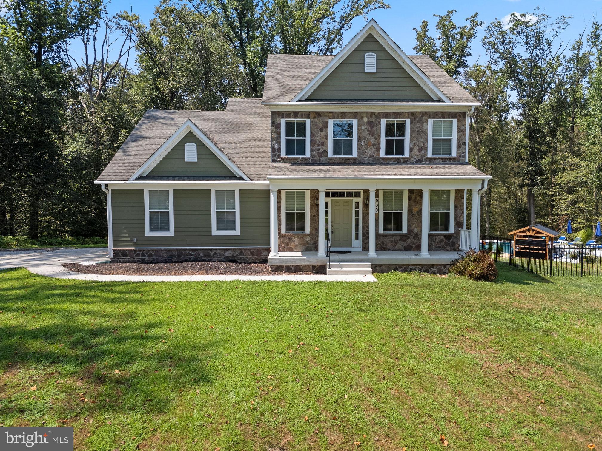 900 East Wheel Road Bel Air, MD 21015 - Photo 3 of 54 Charming home nestled in serene greenery.
