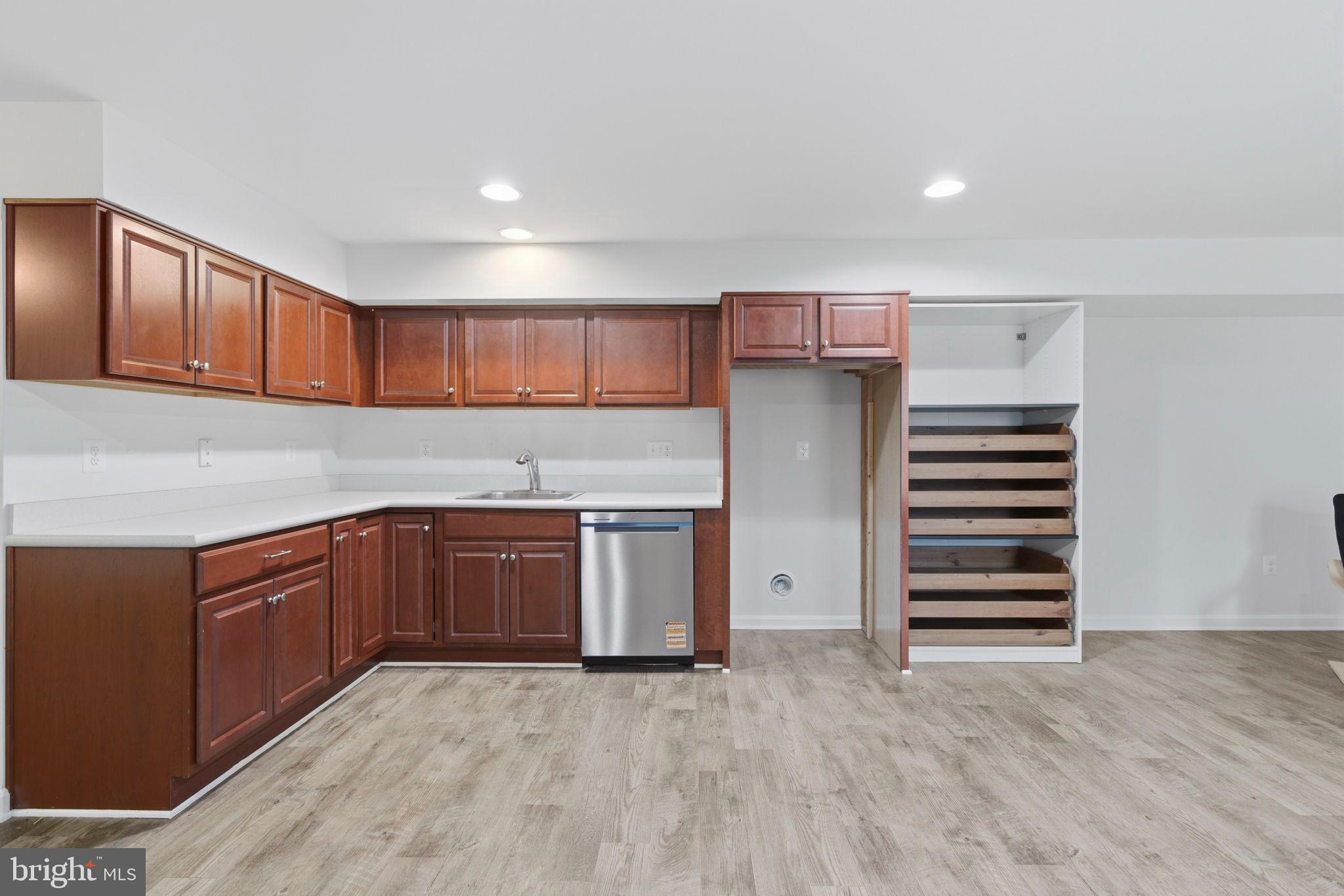 900 East Wheel Road Bel Air, MD 21015 - Photo 33 of 54 Modern kitchen with rich wood cabinetry.