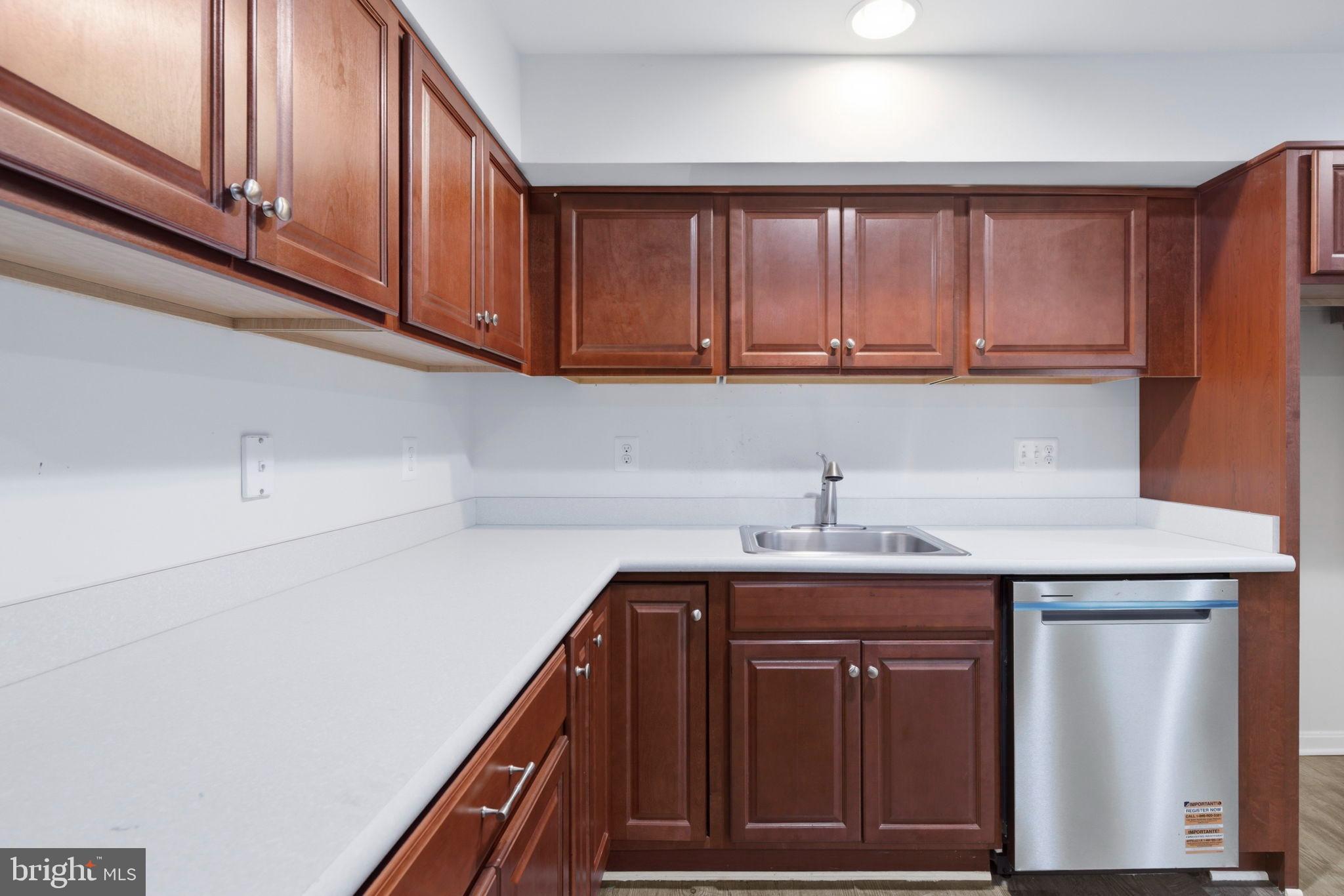 900 East Wheel Road Bel Air, MD 21015 - Photo 34 of 54 Modern kitchen with rich wood cabinetry.