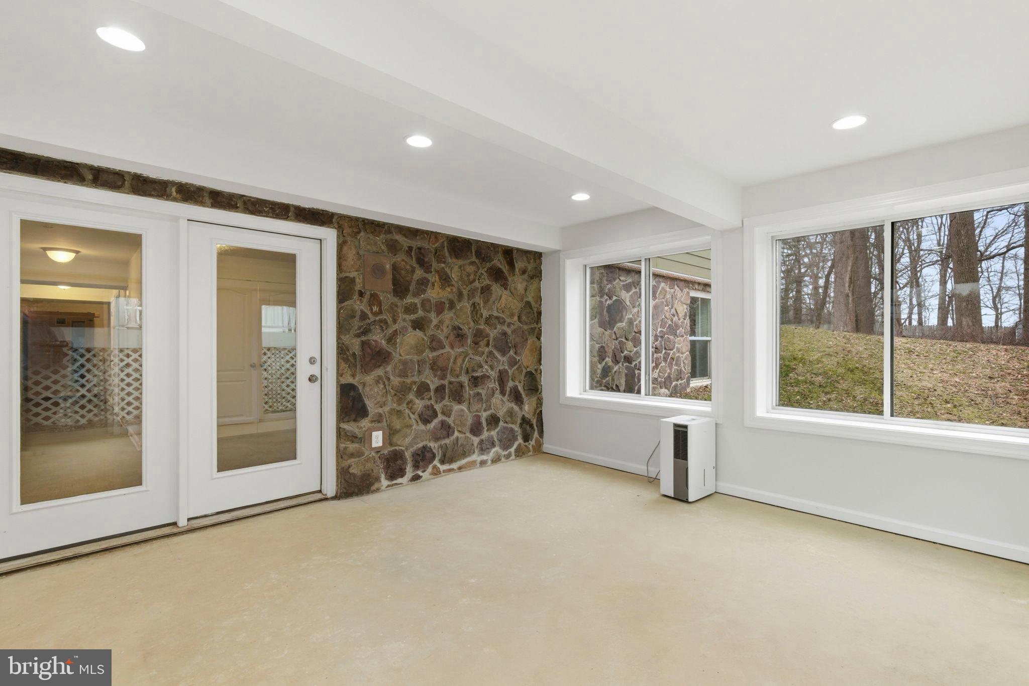 900 East Wheel Road Bel Air, MD 21015 - Photo 41 of 54 Bright and airy space with stone accents.