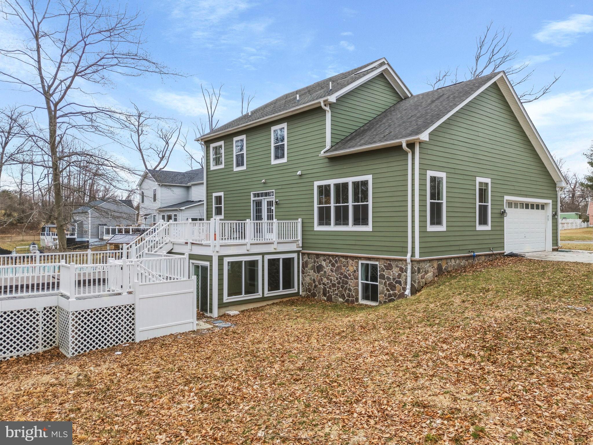 900 East Wheel Road Bel Air, MD 21015 - Photo 46 of 54 Charming green home with spacious deck.