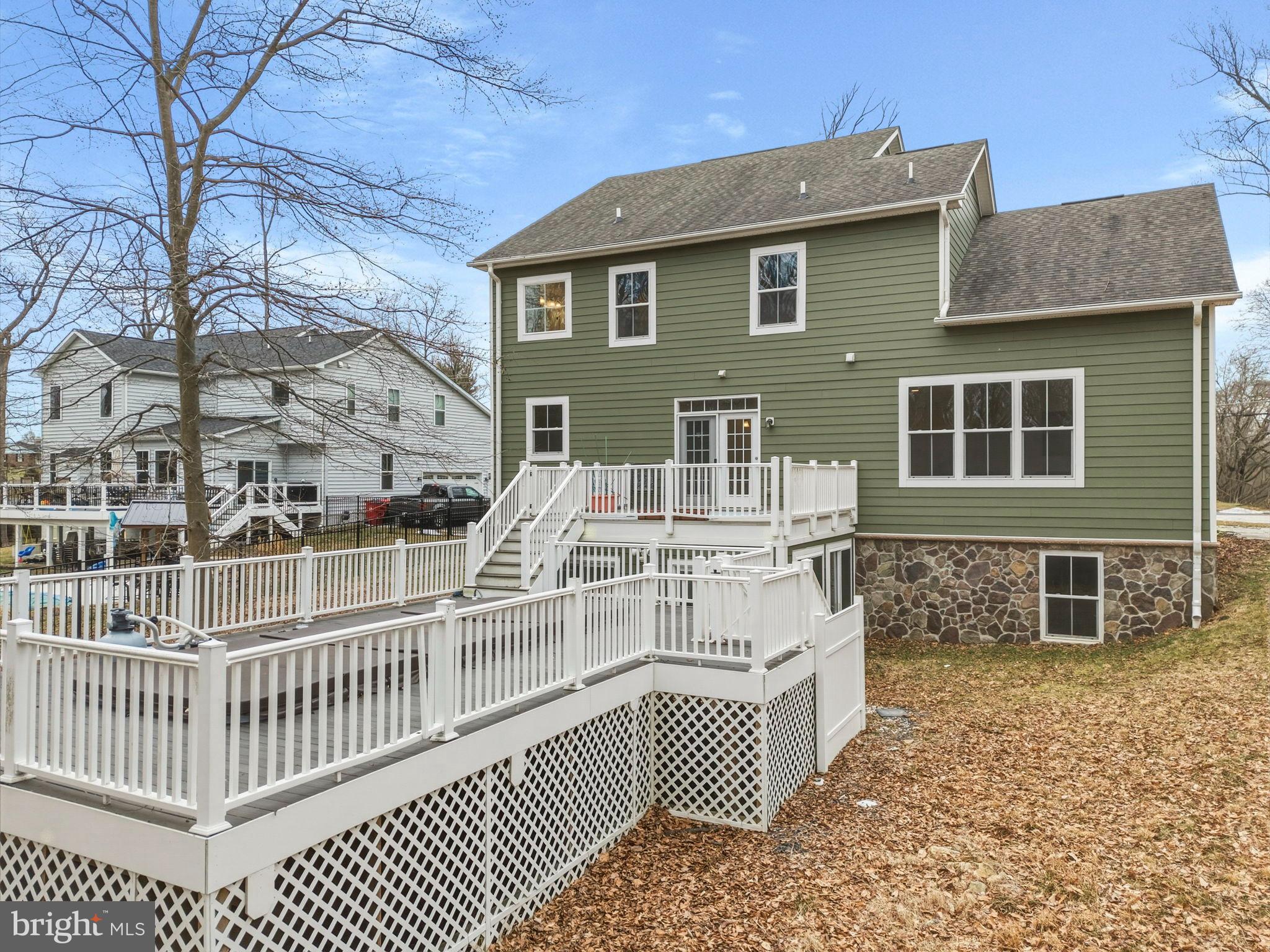 900 East Wheel Road Bel Air, MD 21015 - Photo 47 of 54 Charming green home with spacious deck.