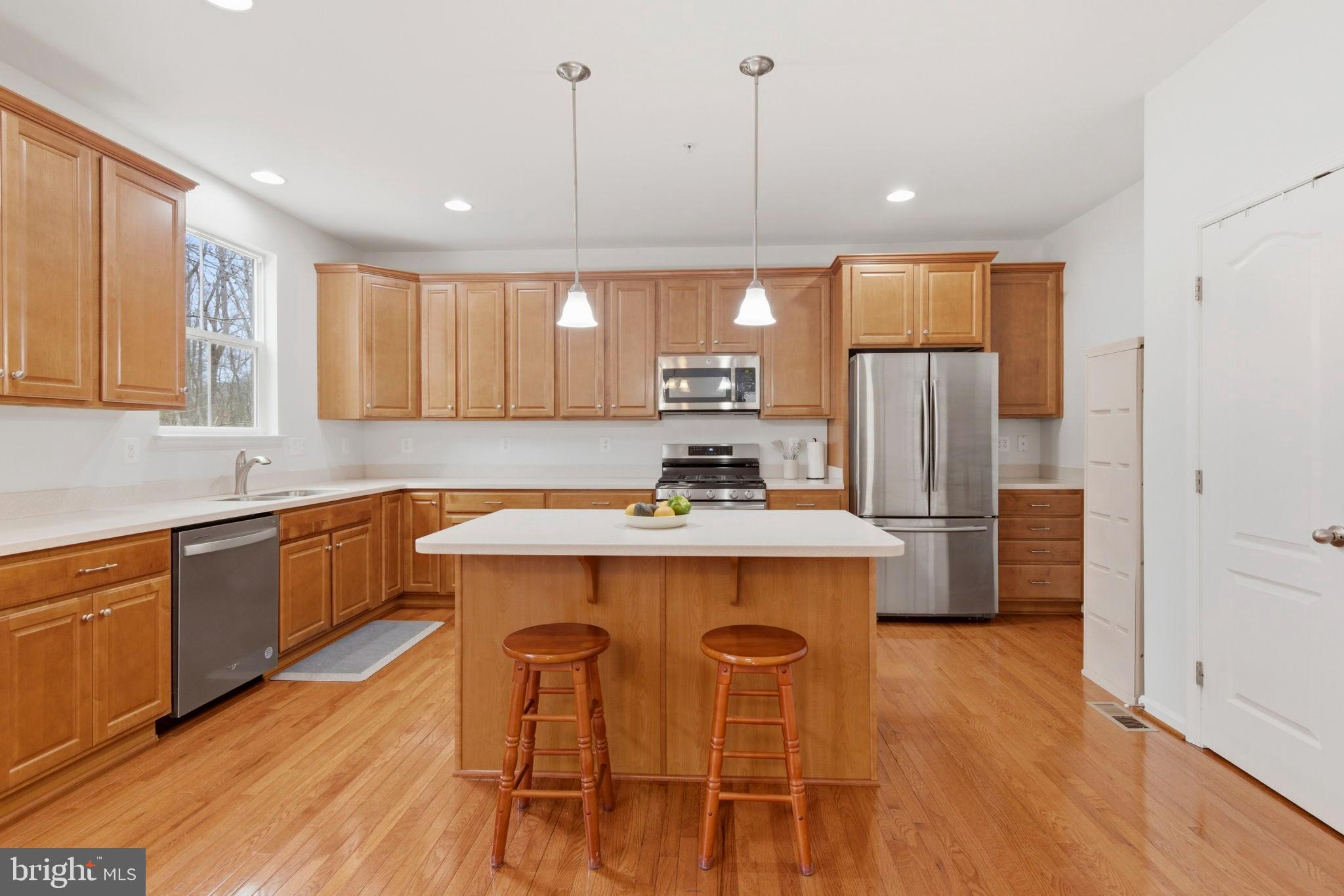 900 East Wheel Road Bel Air, MD 21015 - Photo 6 of 54 Modern kitchen with warm wood accents.