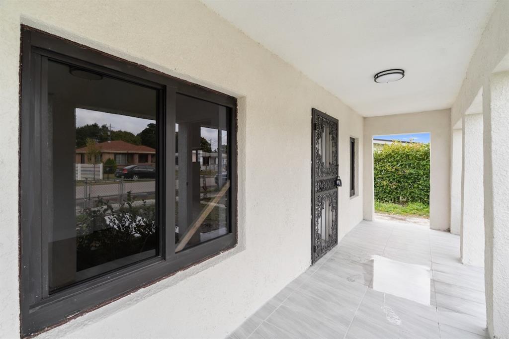 1430 Northwest 74th Street Miami, FL 33147 - Photo 29 of 29 a view of entryway with interior