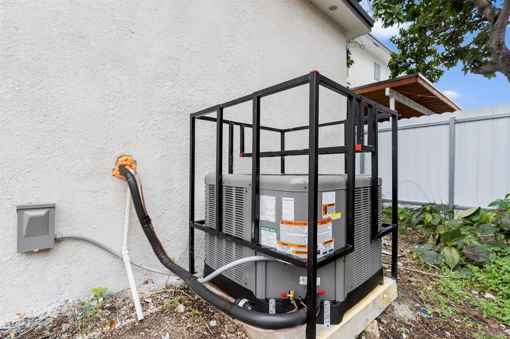 1430 Northwest 74th Street Miami, FL 33147 - Photo 5 of 29 a view of staircase with a rug