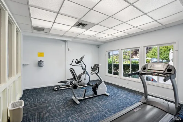 a view of a living room and dining room