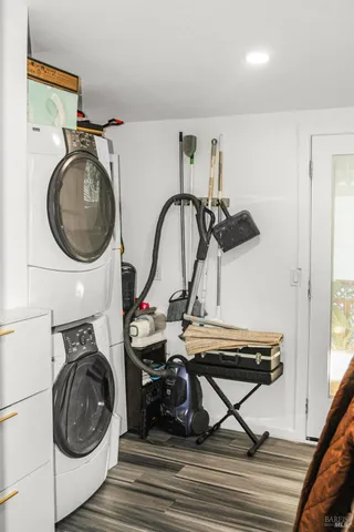 a utility room with sink dryer and washer