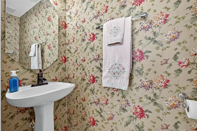 a view of an entryway with wooden floor and staircase