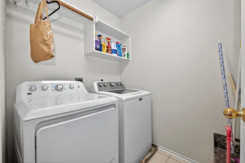 a bathroom with a sink toilet vanity and shower