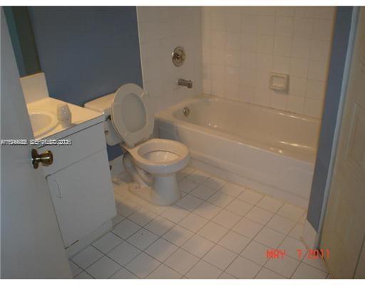 470 South Park Road, Unit 7306 Hollywood, FL 33021 - Photo 10 of 20 a bathroom with a toilet and a shower