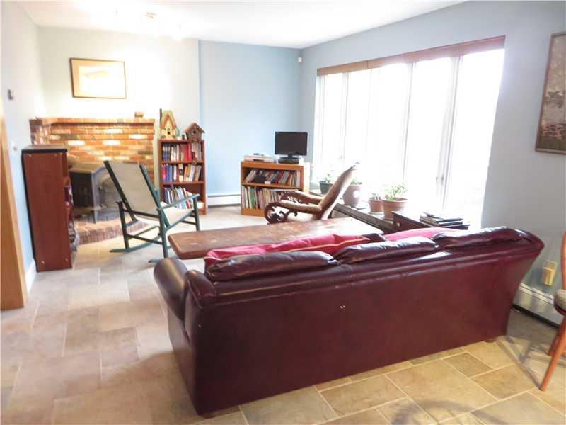 4 T Ledge Road Orrs Island, ME 04066 - Photo 17 of 21 Family Room. Photo shows sliding...