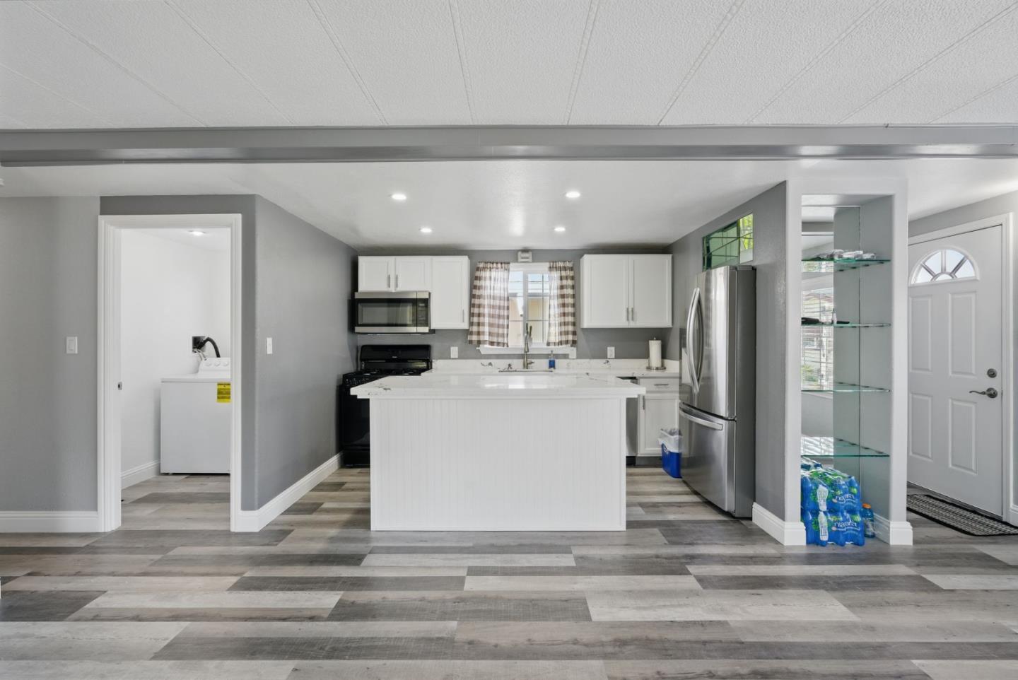 3015 East Bayshore Road, Unit 169 Redwood City, CA 94063 - Photo 13 of 30 a view of kitchen with refrigerator and microwave