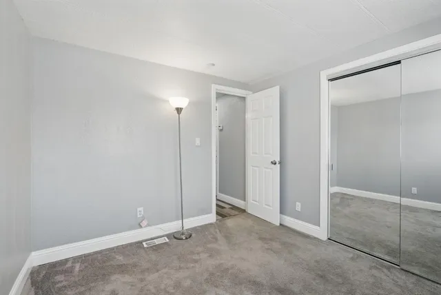 an empty room with sliding door