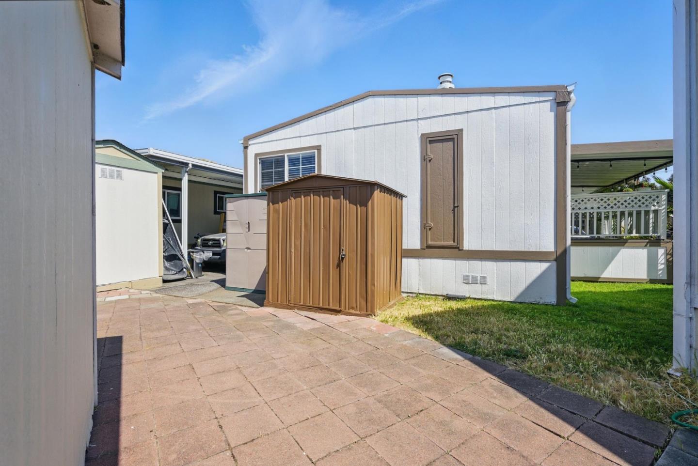 3015 East Bayshore Road, Unit 169 Redwood City, CA 94063 - Photo 23 of 30 a view of a back yard of the house