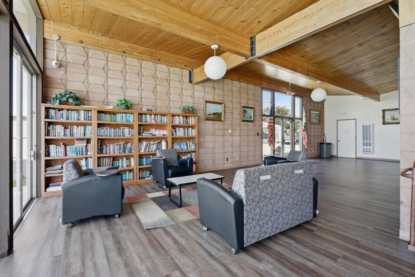 3015 East Bayshore Road, Unit 169 Redwood City, CA 94063 - Photo 27 of 30 a living room with furniture and a book shelf