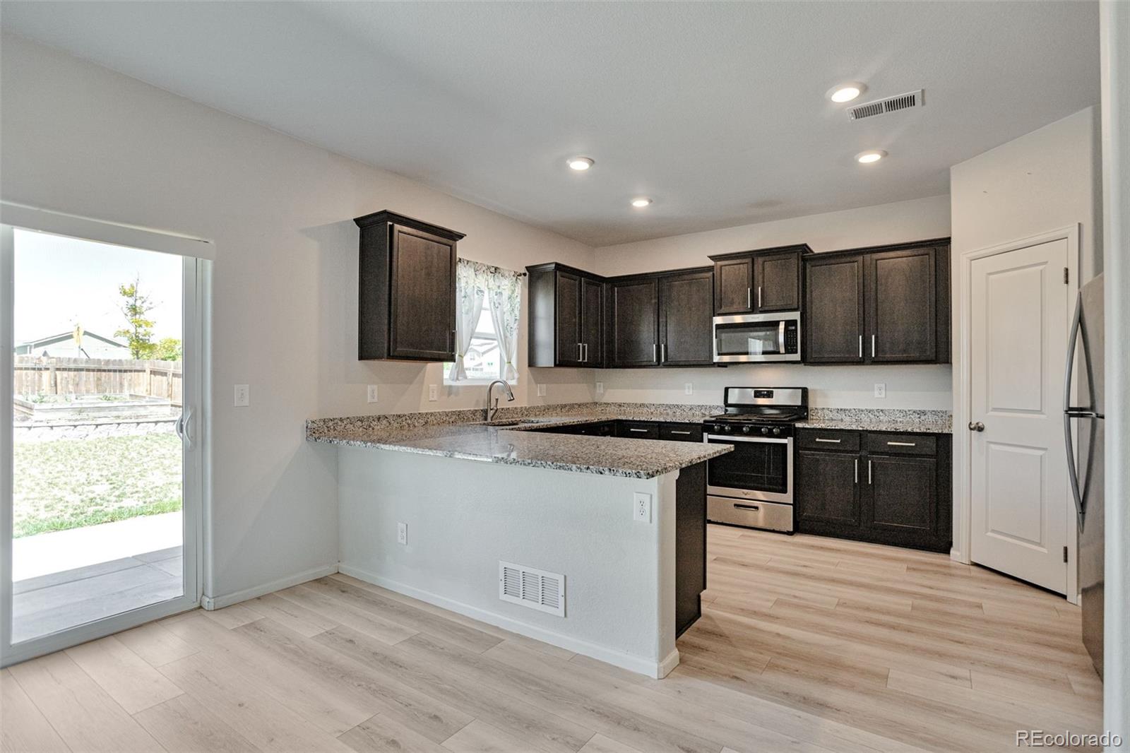 359 Maple Street Bennett, CO 80102 - Photo 8 of 26