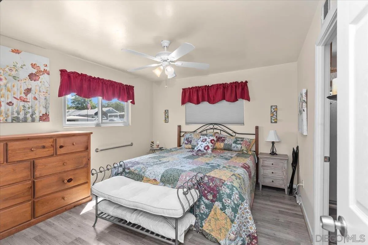 9254 Shadow Hill Road Santee, CA 92071 - Photo 24 of 34 a bedroom with a bed and a dresser