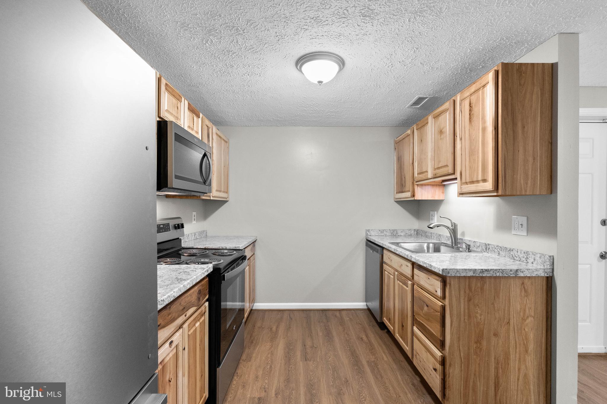 3925 Greencastle Road, Unit 103 Burtonsville, MD 20866 - Photo 9 of 24 Kitchen