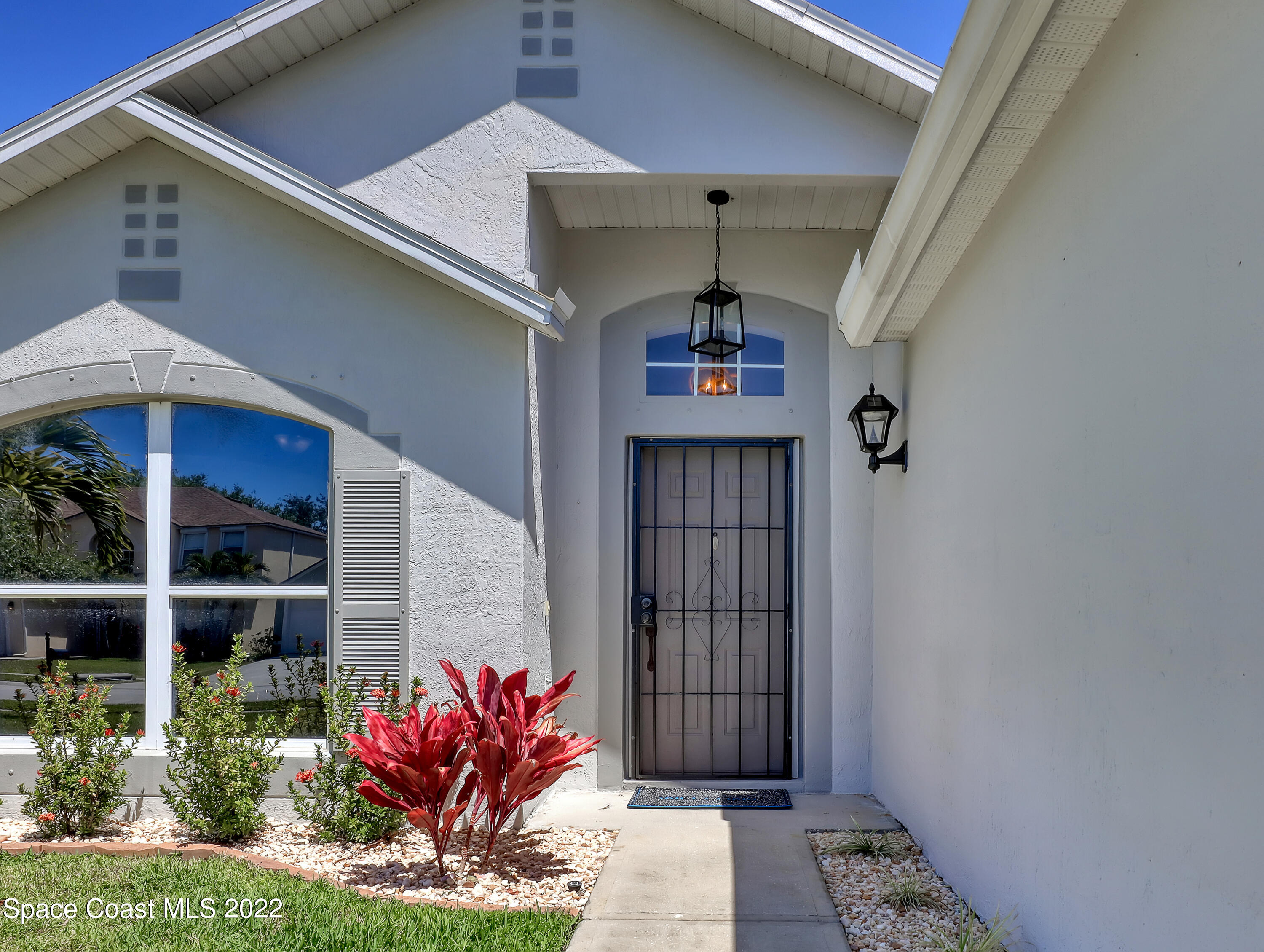 4920 Spinet Drive Melbourne, FL 32940 - Photo 2 of 44 a view of a entryway of the house