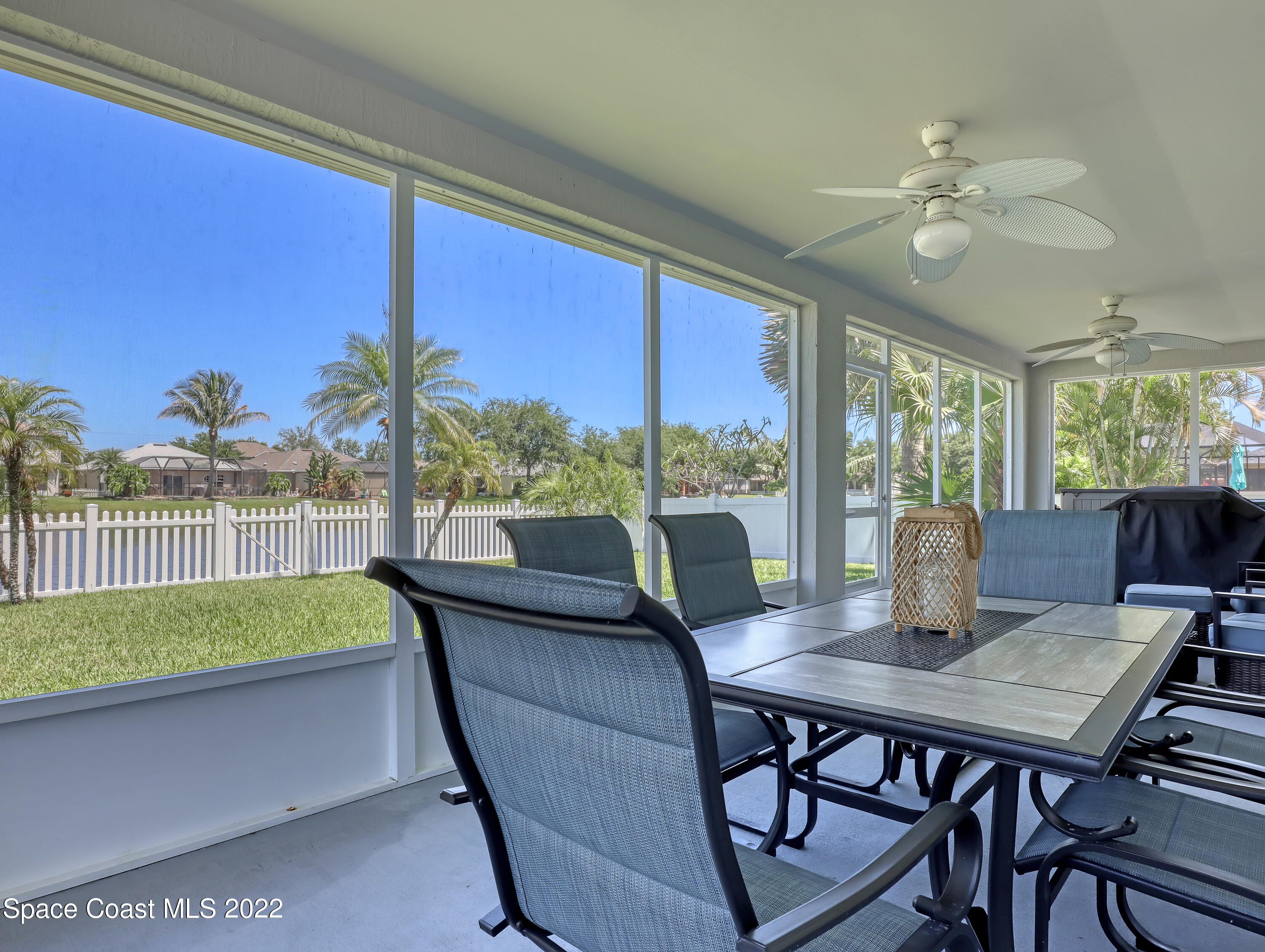 4920 Spinet Drive Melbourne, FL 32940 - Photo 27 of 44 a view of a dining room with furniture window and outside view