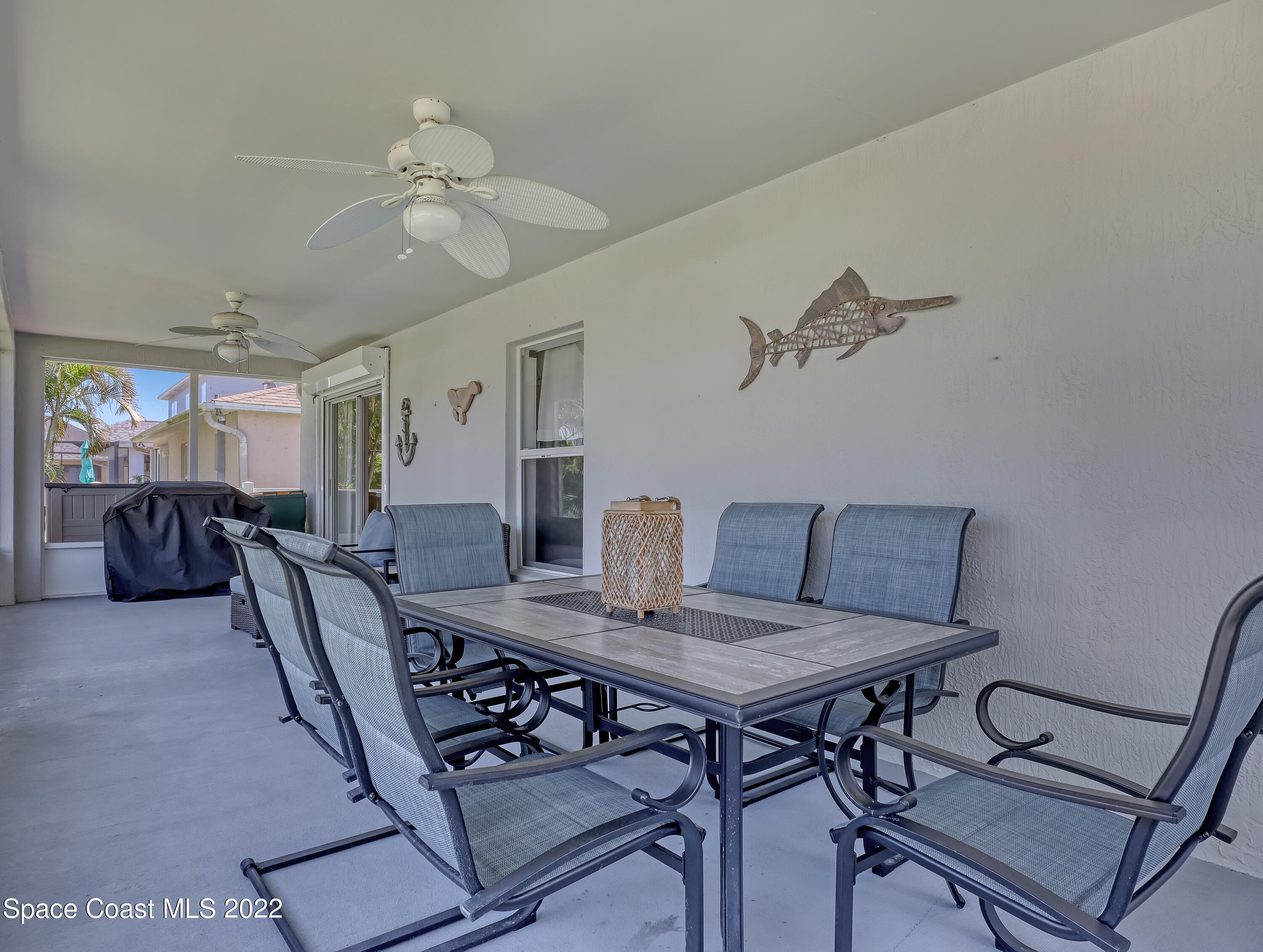 4920 Spinet Drive Melbourne, FL 32940 - Photo 28 of 44 a view of a livingroom and dining room