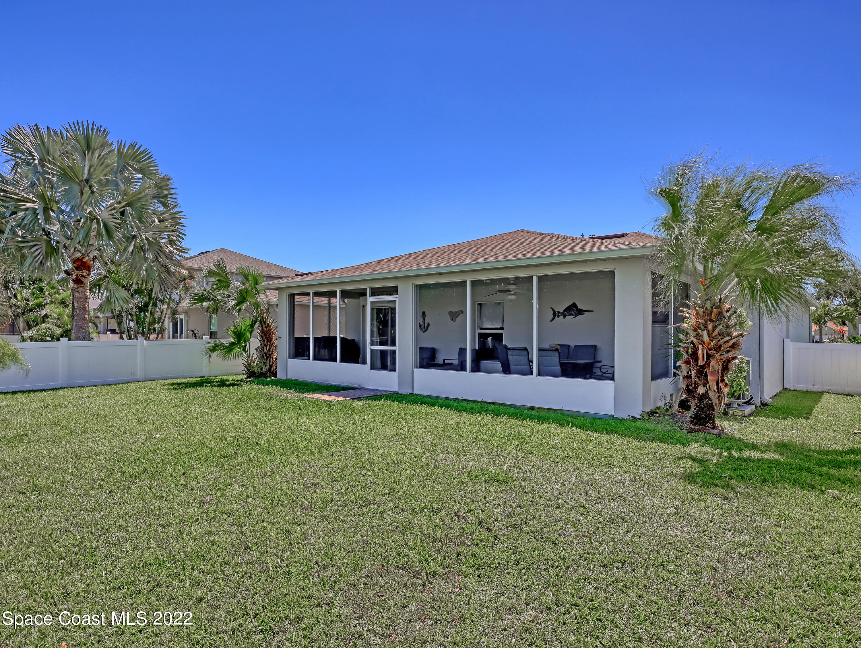 4920 Spinet Drive Melbourne, FL 32940 - Photo 31 of 44 a view of a house with a backyard