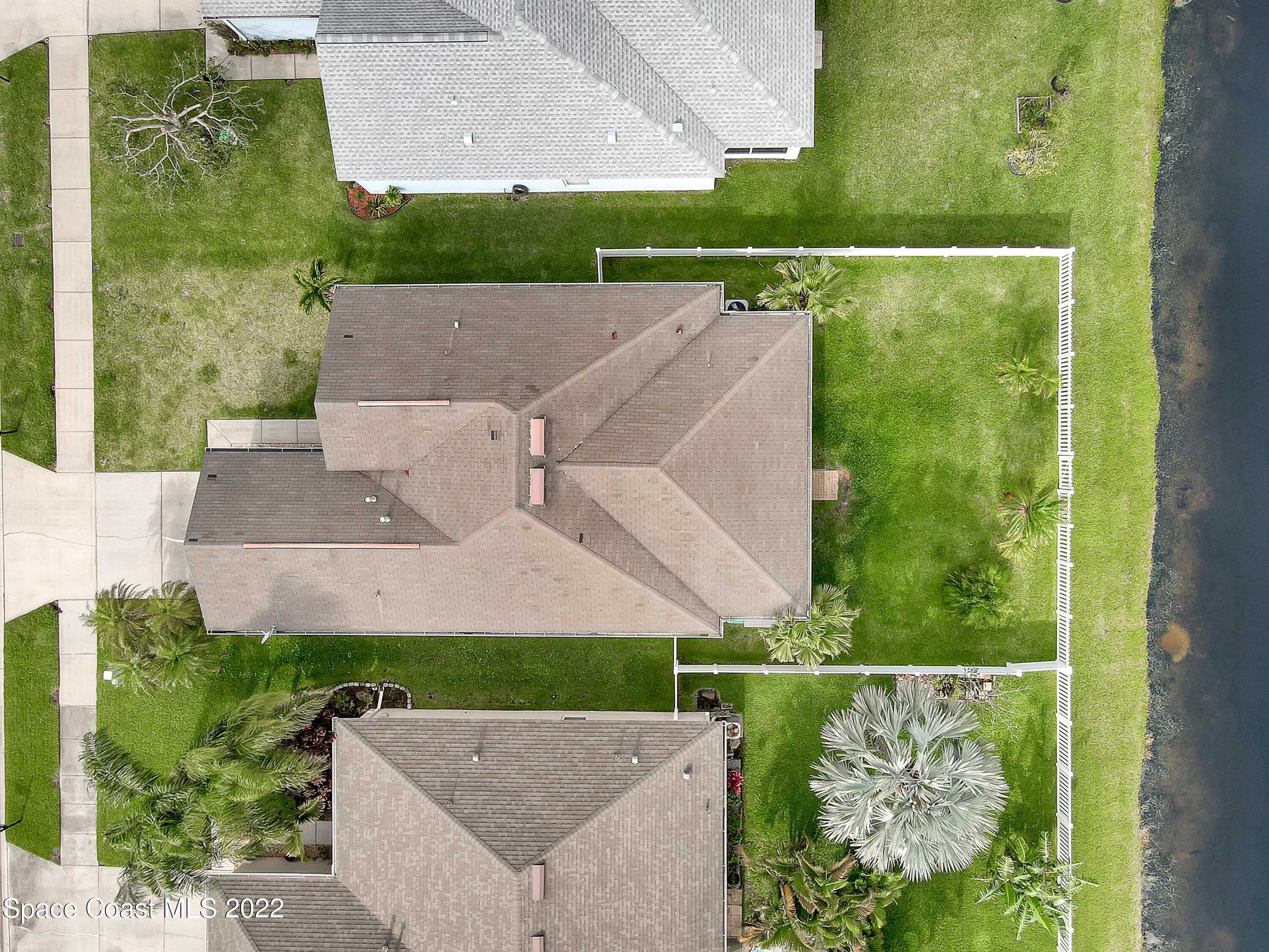 4920 Spinet Drive Melbourne, FL 32940 - Photo 40 of 44 an aerial view of a house