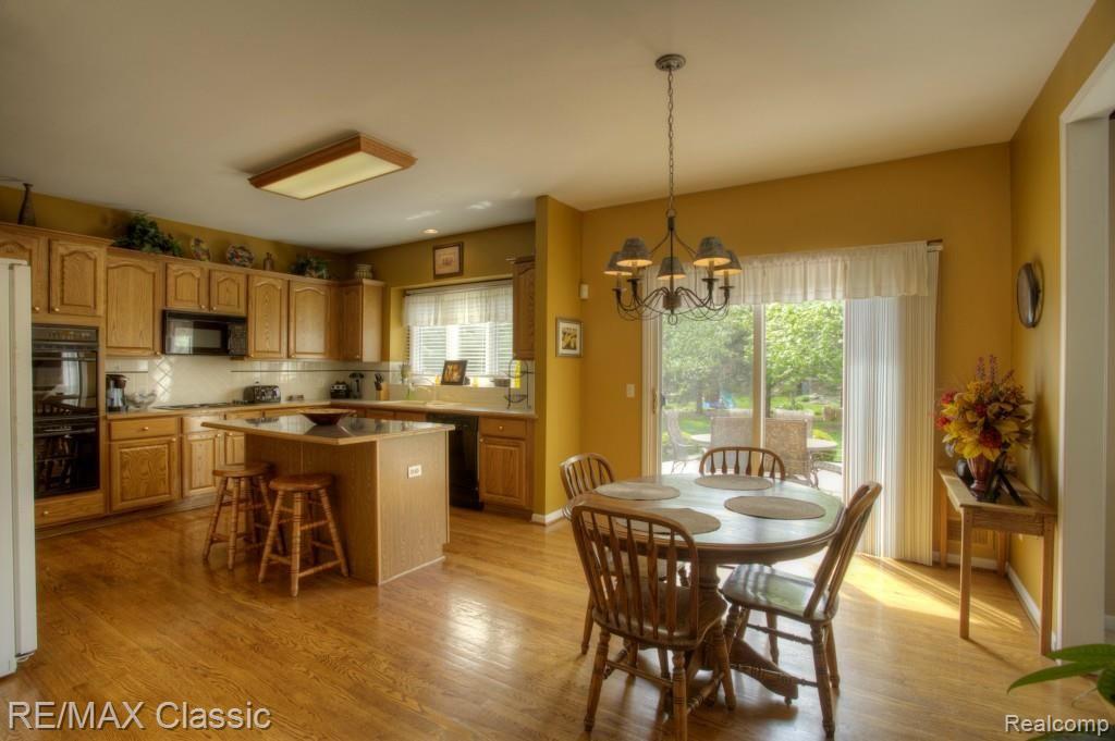 47950 Pavillon Road Canton, MI 48188 - Photo 8 of 29 Breakfast Nook into Kitchen