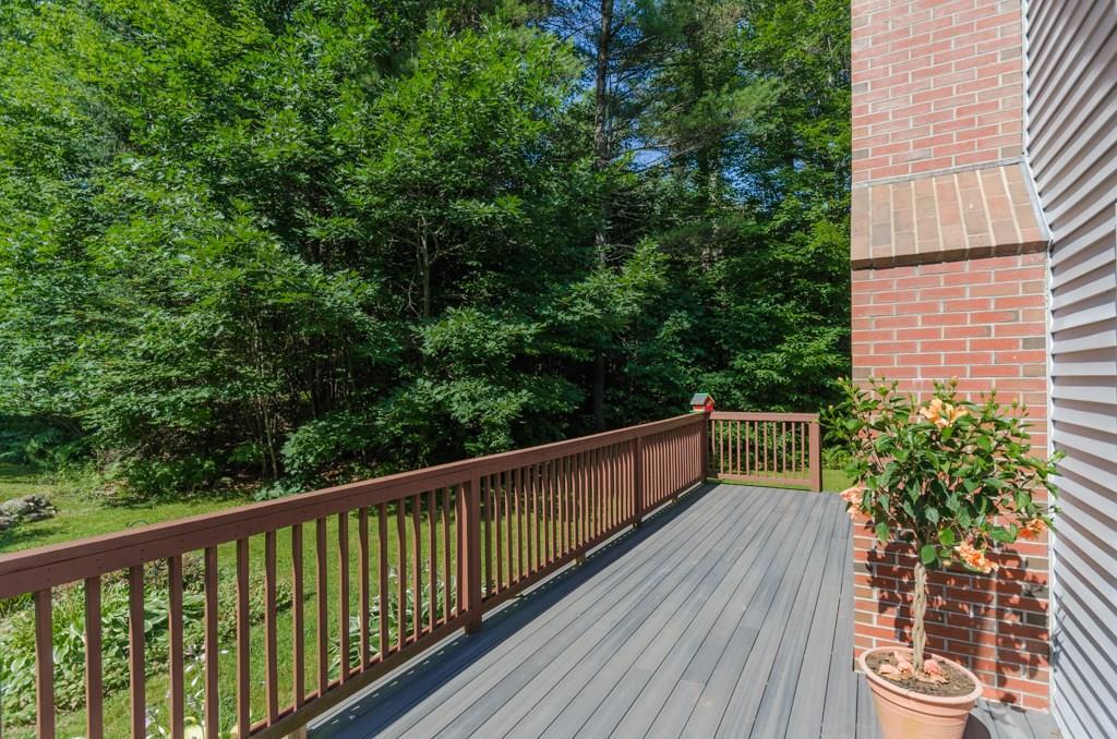 233 Parsons Road Norway, ME 04268 - Photo 5 of 34 front deck spans front of home