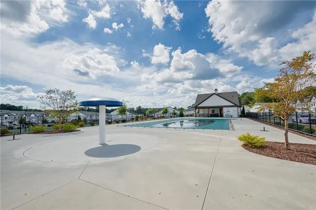 a view of a basket ball ground in front of the house