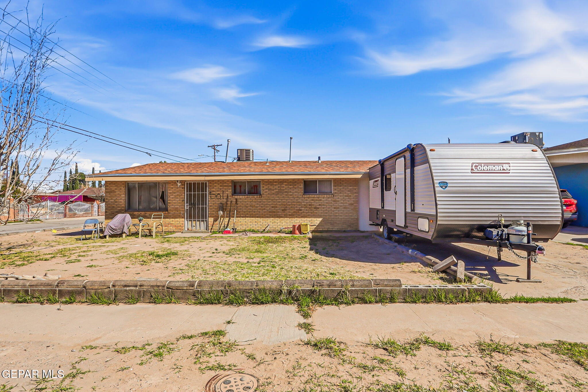 501 South 8th Street Anthony, TX 79821 - Photo 26 of 37 a front view of a house with swimming pool and sitting area