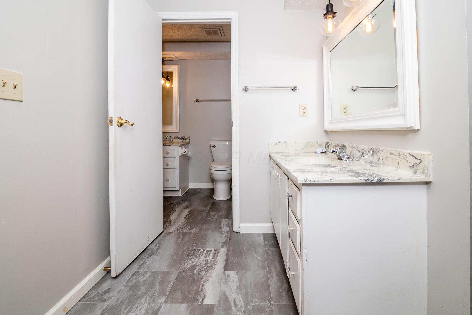 5179 Rittenhouse Square North, Unit 2379 Columbus, OH 43220 - Photo 22 of 32 Jack & Jill Vanity and Mirror off Bedroom #3.