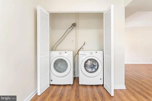 a view of washer and dryer in a utility room