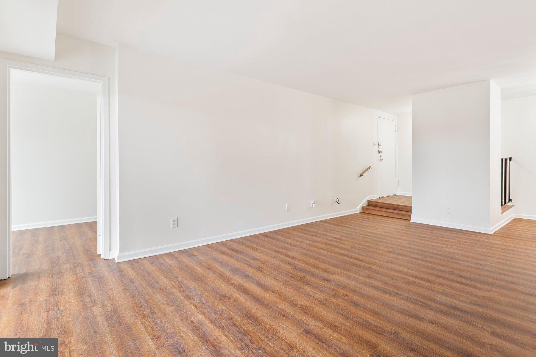 11234 Cherry Hill Road, Unit 304 Beltsville, MD 20705 - Photo 8 of 28 a view of empty room with wooden floor