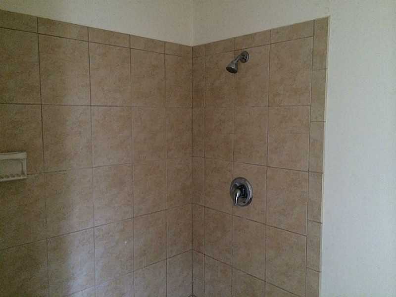 45 Batterson Avenue Westerly, RI 02891 - Photo 9 of 15 Bathroom. high end tile stand up shower in First floor master bathroom