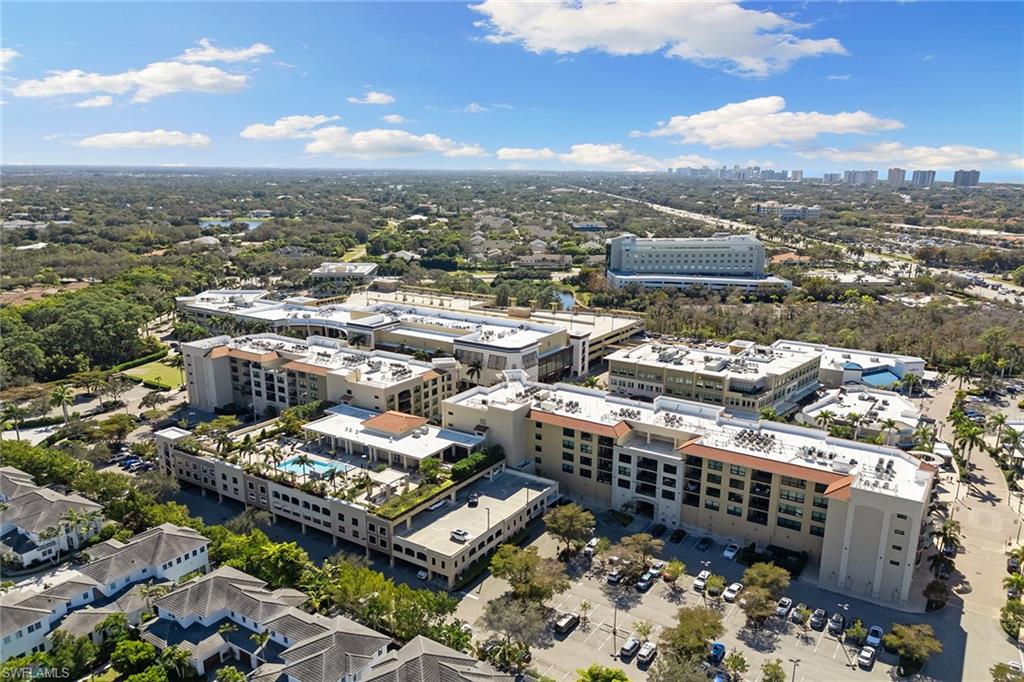 9123 Strada Place, Unit 7510 Naples, FL 34108 - Photo 37 of 38 View of urban area featuring apartment complex / building