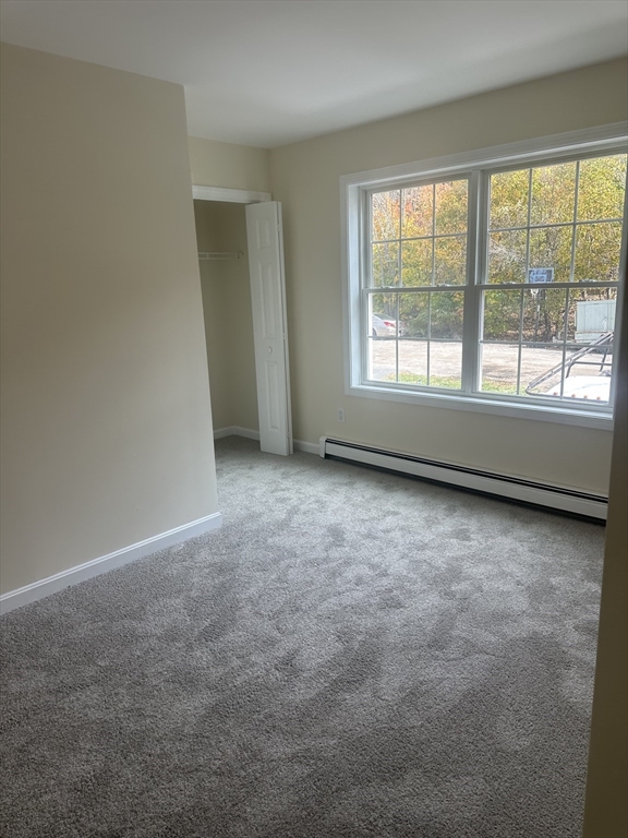 33 Denmark Street, Unit 33 Worcester, MA 01605 - Photo 7 of 10 an empty room with a window