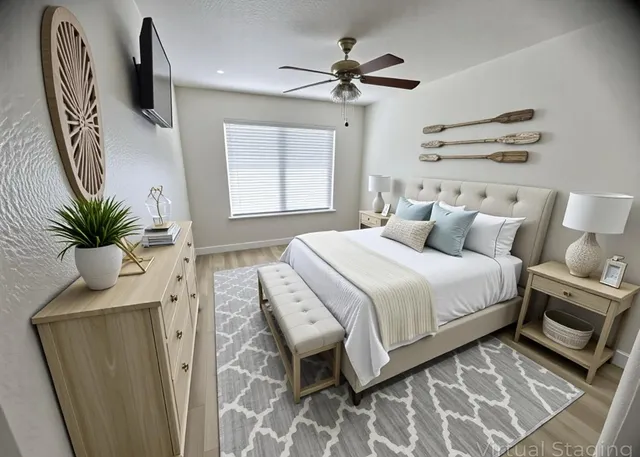 a bedroom with a large bed and a window