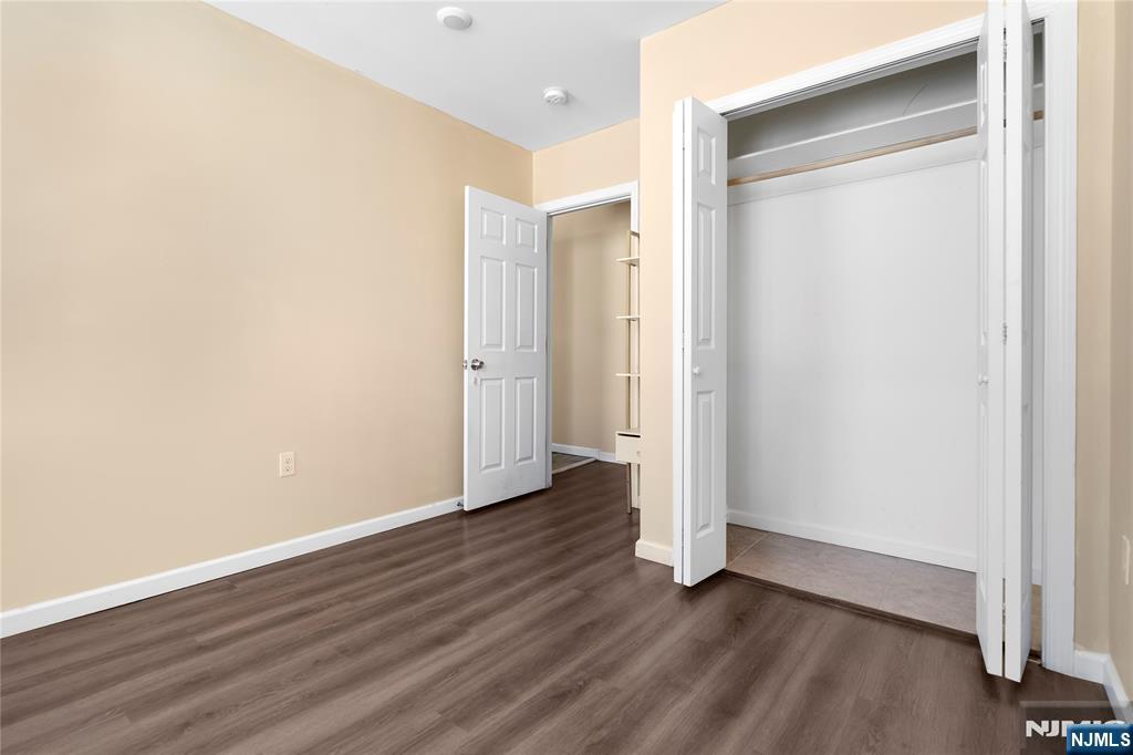 183 Bergen Turnpike Ridgefield Park, NJ 07660 - Photo 12 of 18 a view of wooden floor in an empty room