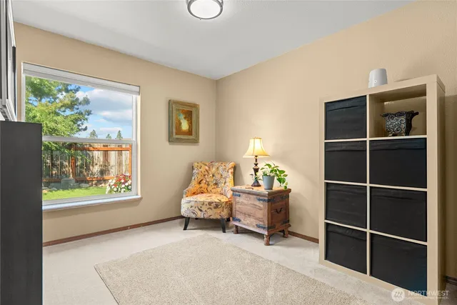 a bed room with a bed and a window